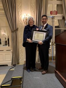 Dr. Diane LoRusso recieving Citation recognizing her 50 years in medicine from Westchester County Medical Society’s President Omar Syed at the society's 2019 Annual Meeting